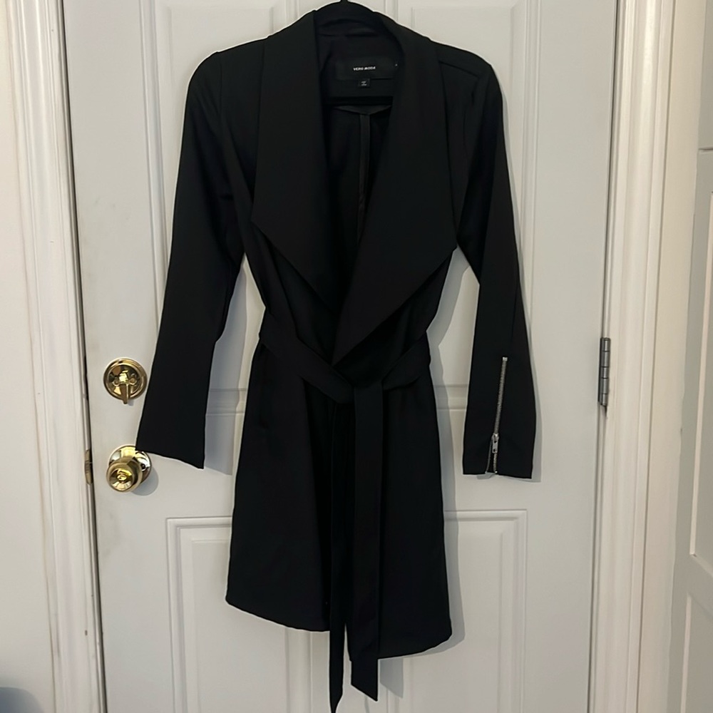 Black, light, mid length jacket.